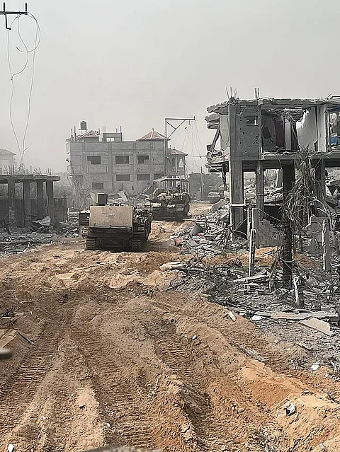 Israeli soldiers conducting military operations across the Gaza Strip