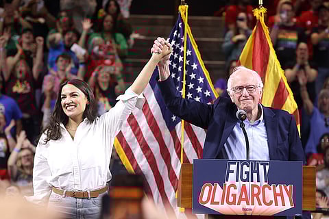 Alexandria Ocasio-Cortez and Bernie Sanders at a "Fight Oligarchy" rally at Mullett Arena in Tempe, Arizona. 20 March 2025