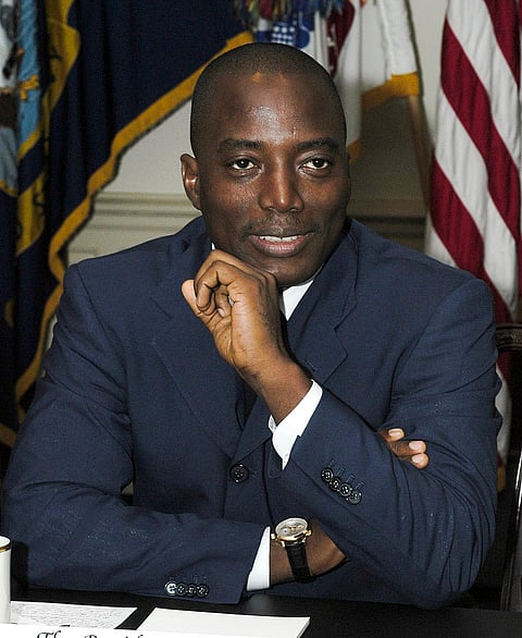 Ex President Joseph Kabila meets with Deputy Secretary of Defense Paul Wolfowitz at the Pentagon on Nov. 6, 2003.