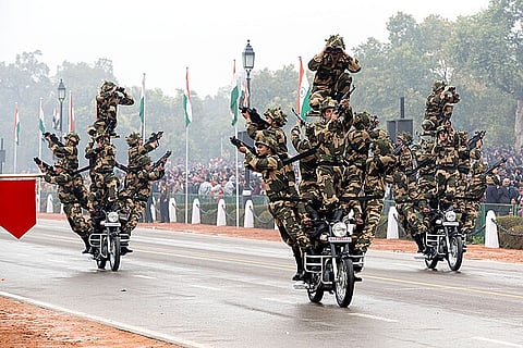 Members of the India's Border Security Force Dare Devils pass by on motorcycles during the Republic Day Parade in New Delhi, India, Jan. 26, 2015.