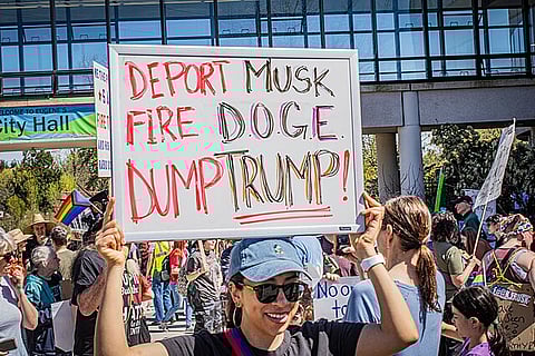 Hands Off rally in Eugene, Oregon, protesting Donald Trump and Elon Musk's cuts to public services and the administration in general.