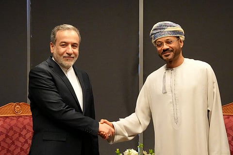 Iranian FM Abbas Araghchi with Oman's FM, the official mediator of US-Iran talks