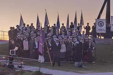 The choir performs spring songs at Uppsala Castle on Walpurgis night, which authorities assured to be safe despite recent murders