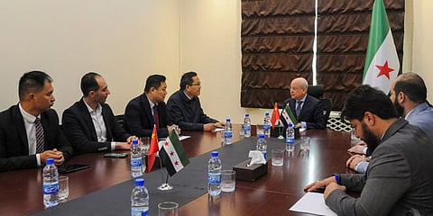 Syrian Minister of Transport meeting Chinese a delegation