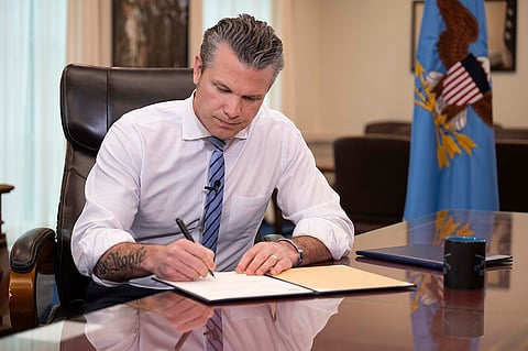 Pete Hegseth signs a flag officer memorandum at the Pentagon, Washington, D.C., May 5, 2025.