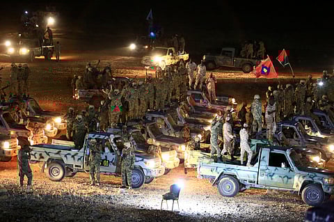 The Sudanese Armed Forces conduct evening ground drills in Shakhout area, north of the Sudanese capital Khartoum.