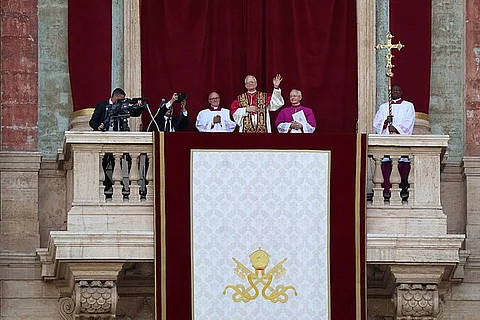 Pope Leo XIV appears on the St. Peter’s Basilica loggia following his election.