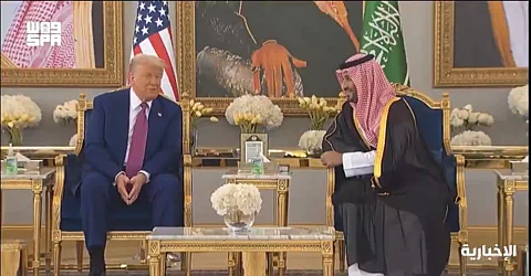 President Donald Trump speaks with Crown Prince Mohammed bin Salman.