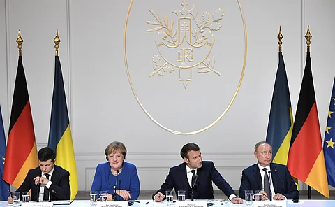 Ukrainian President Volodymyr Zelensky, German Chancellor Angela Merkel, French President Emmanuel Macron and Russian President Vladimir Putin, 2019.
