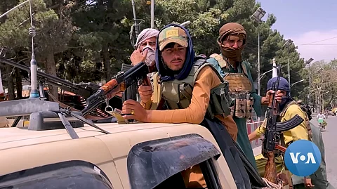 Taliban fighters during the fall of Kabul