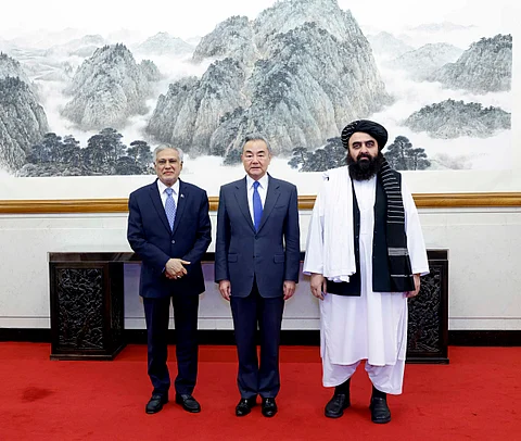 Pakistani Foreign Minister Mohammad Ishaq Dar, Chinese Foreign Minister Wang Yi and Afghan Acting Foreign Minister Amir Khan Muttaqi