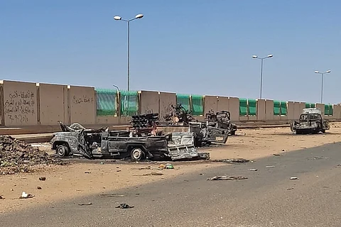 Destroyed vehicles in southern Khartoum, Sudan, on April 19, 2023, amid fighting between Sudan's regular army and paramilitaries following the collapse of a 24-hour truce.