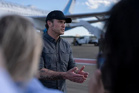 Hegseth speaks to members of the press at Pope Army Airfield, N.C., May 22, 2025.