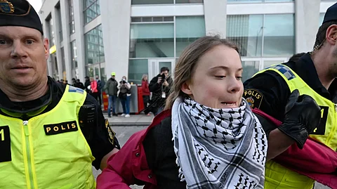 Greta Thunberg being arrested at a protest against Israel's ongoing genocide.