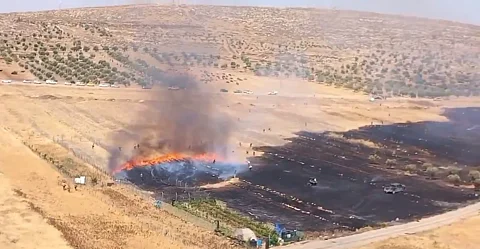 Israelis set fire to a large farming area in Al-Mughayir, near Ramallah in Palestine.