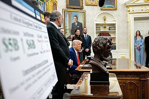 President Trump, joined by Commerce Secretary Lutnick, VP Vance, UK Ambassador Mandelson, USTR Greer, and Agriculture Secretary Rollins, announces a UK trade deal in the Oval Office, May 8, 2025.