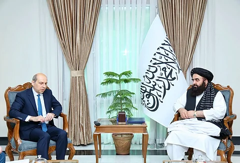 Russian Ambassador to Afghanistan Dmitry Zhirnov and Afghan Acting Foreign Minister Amir Khan Muttaqi