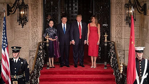 President Donald Trump and First Lady Melania Trump welcome Xi Jinping and Peng Liyuan to Mar-a-Lago in 2017.