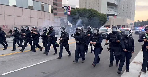 ICE raids across Los Angeles on June 6, 2025, trigger protests and confrontations with riot police.