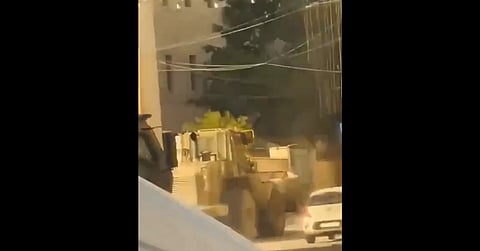Footage published by the Palestinian Information Center show vehicles advancing alongside military forces.