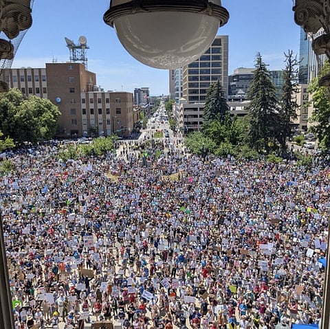 A massive "No Kings" protest in Boise, Idaho, on June 14, 2025, coinciding with Trump’s 79th birthday and a military parade in Washington, D.C., with over 4 million participants nationwide.