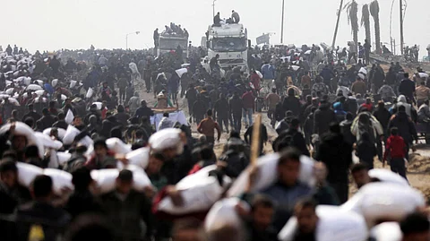 Israeli forces reportedly open fired on a crowd seeking humanitarian aid, killing at least 51.