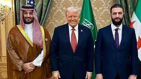 President of the United States Donald Trump with Saudi Crown Prince Mohammed Bin Salman and President of Syria Ahmed al-Sharaa during Donald Trump's state visit to Saudi Arabia.