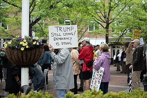 People in Princeton NJ protesting against, among other things: DOGE, Elon Musk, Trump, and ICE.
