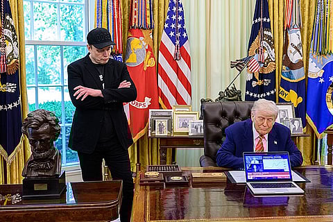 President Donald Trump participates in a press conference with departing DOGE adviser Elon Musk, Friday, May 30, 2025, in the Oval Office.
