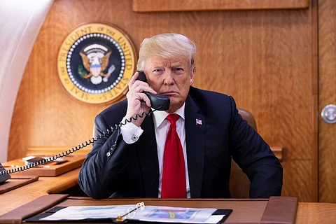President Donald Trump on the phone (For illustrative purposes only)