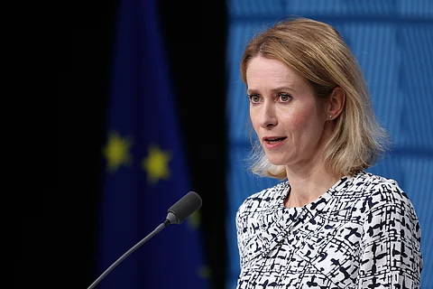 Kaja Kallas behind a microphone