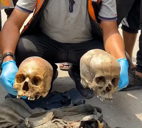 Human skulls and bones uncovered in Al-Shujaiya, a historically significant Gaza neighborhood, repeatedly targeted in Israeli strikes.