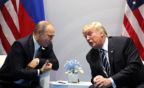 Donald Trump and Vladimir Putin convene at the 2017 G20 Summit in Hamburg.