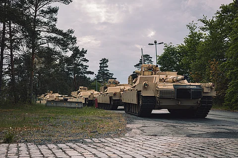 U.S. M1A1 Abrams tanks needed for training the Armed Forces of Ukraine await transport to training areas at Grafenwoehr, Germany, May 14, 2023