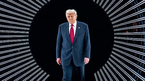 President Donald Trump arrives on stage to deliver remarks at the America Business Forum Miami at the Kaseya Center in Miami, Florida, Wednesday, November 5, 2025.