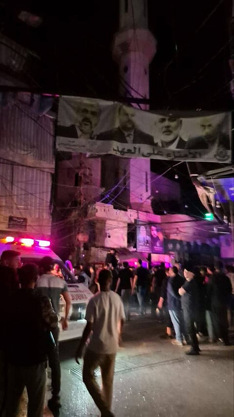 Ambulances come and go at the Ain al Hilweh refugee camp, Sidon, Southern Lebanon.