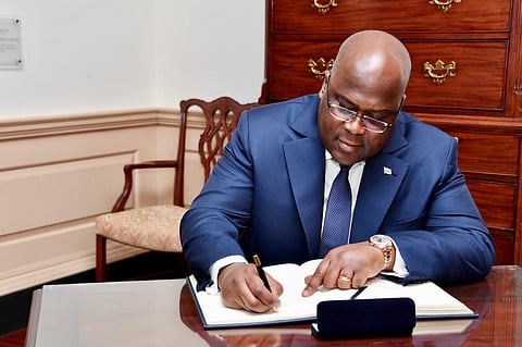 Republic of the Congo President Felix Tshisekedi signs Secretary Pompeo's guestbook before their meeting at the U.S. Department of State in Washington, D.C., on April 3, 2019.