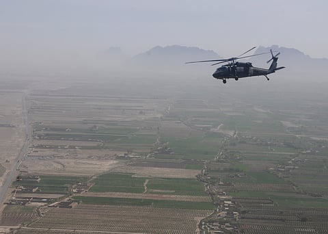 A UH-60 Black Hawk helicopter over Kandahar Province, Afghanistan, 2013.