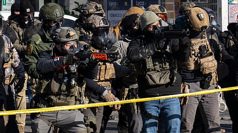 ICE and Border Patrol agents on Nicollet Avenue on January 24, 2026.