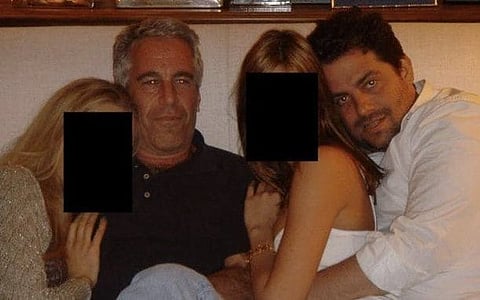 Brett Ratner photographed alongside Jeffrey Epstein and two young women.
