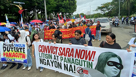 Protesters call for the impeachment of Philippine Vice President Sara Duterte, 11 June 2025.