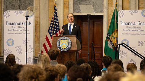 U.S. Treasury Secretary Scott Bessent addresses students during a financial literacy fair at the Department of the Treasury on April 30, 2026.