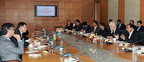 Dr. M. Veerappa Moily and Ecuador’s Minister Pedro Merizalde meet at PETROTECH 2014 in Noida on January 14, 2014.
