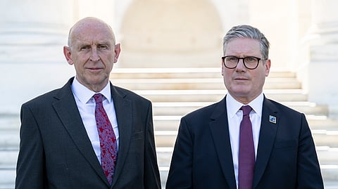 British Defence Secretary John Healey, left, and British Prime Minister Keir Starmer, right, pose for a photo on July 11, 2024.