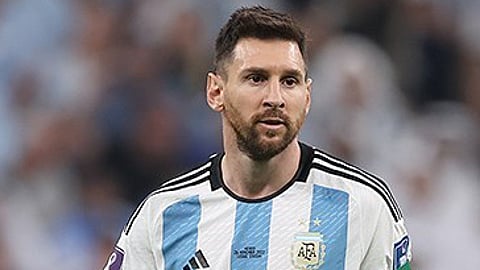 Lionel Messi playing for Argentina at the 2022 FIFA World Cup.