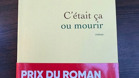 A copy of the book "C'etait ca ou mourir", a novel by author Thelyson Orelien.