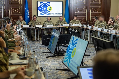 he Chair of the NATO Military Committee, Admiral Giuseppe Cavo Dragone, at the NATO-Ukraine Council during the NATO Military Committee visit to Ukraine