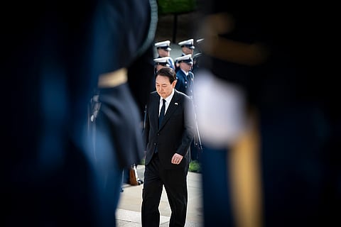 Yoon Suk Yeol participates in a wreath-laying ceremony at the Tomb of the Unknown Soldier at Arlington National Cemetery, Arlington, Virginia, April 25, 2023.