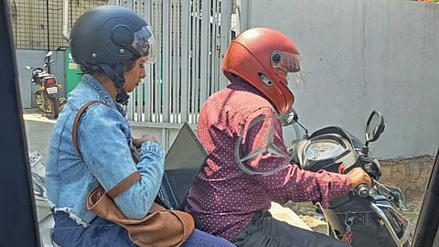 Bengaluru Woman Stuck in Traffic Works on Scooter, Viral Pic Shows Her With Laptop on Rapido