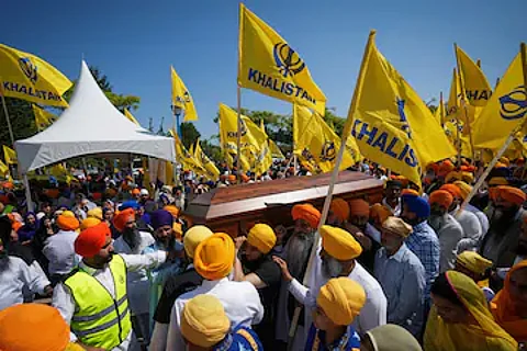 The funeral procession of Hardeep Singh Nijjar in Surrey, British Columbia on June 25, 2023. Nijjar was shot dead outside a Sikh temple on June 18 in a Vancouver suburb with a large Sikh population. (